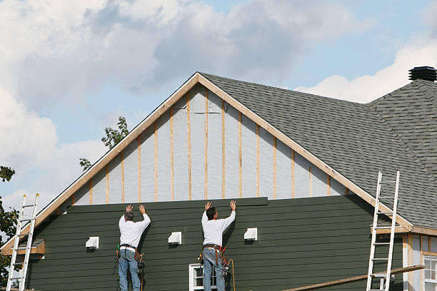 Professional Siding Contractor technician working in Paxinos, PA